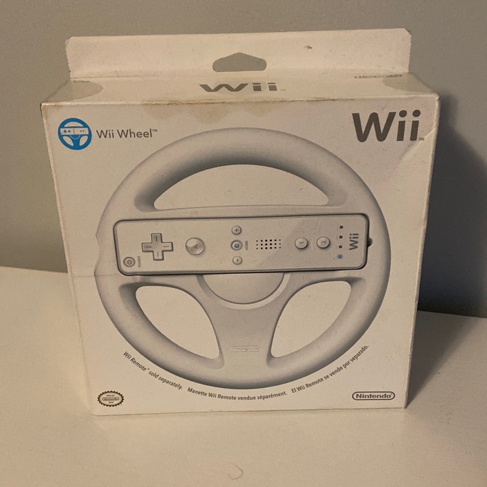 Wii Wheel new in box. Never used.
